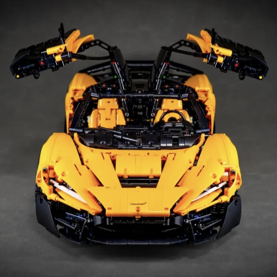 Orange MOC 03 top-down front view with hood and doors open